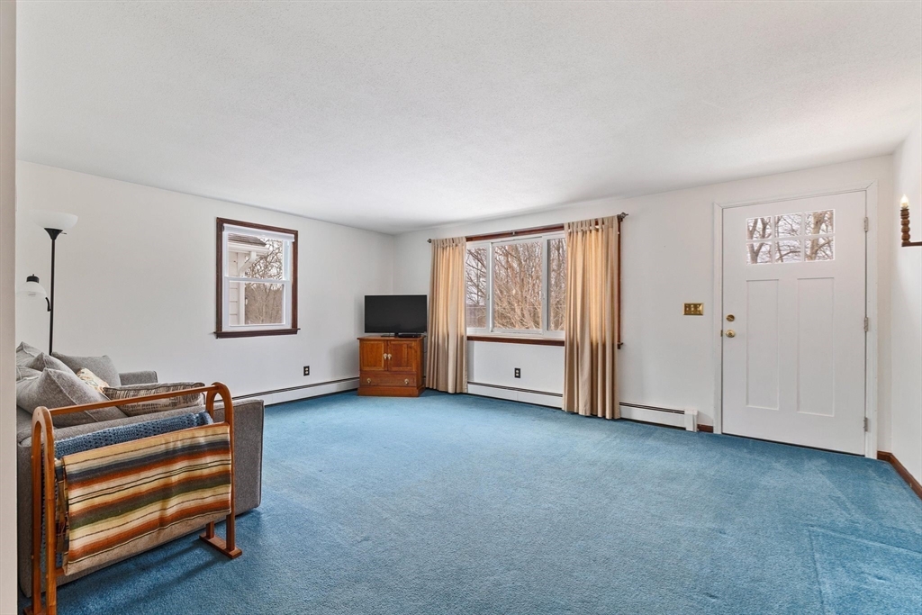8 Cider Mill Road North Brookfield, MA 01535 - Photo 2 of 30 a view of livingroom with furniture and closet