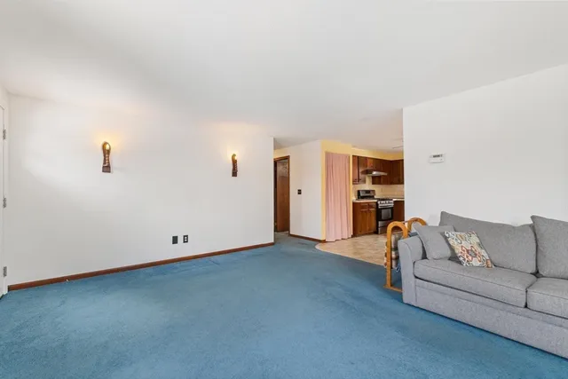 a living room with furniture and a couch