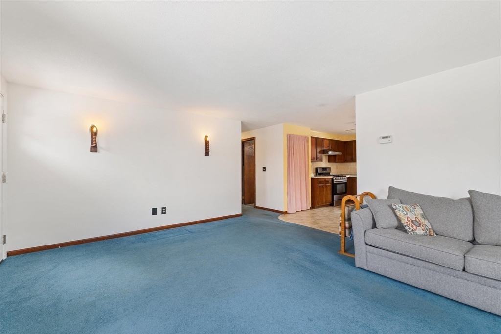 8 Cider Mill Road North Brookfield, MA 01535 - Photo 3 of 30 a living room with furniture and a couch