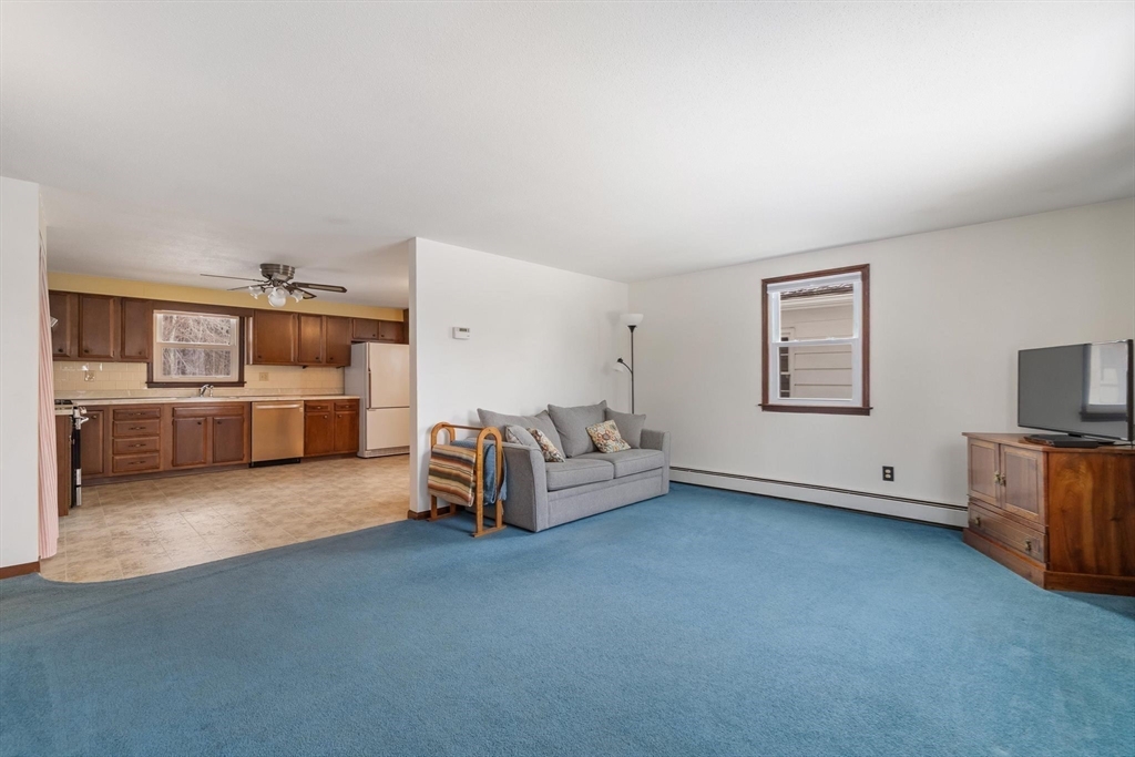 8 Cider Mill Road North Brookfield, MA 01535 - Photo 4 of 30 a view of a livingroom with furniture and a flat screen tv