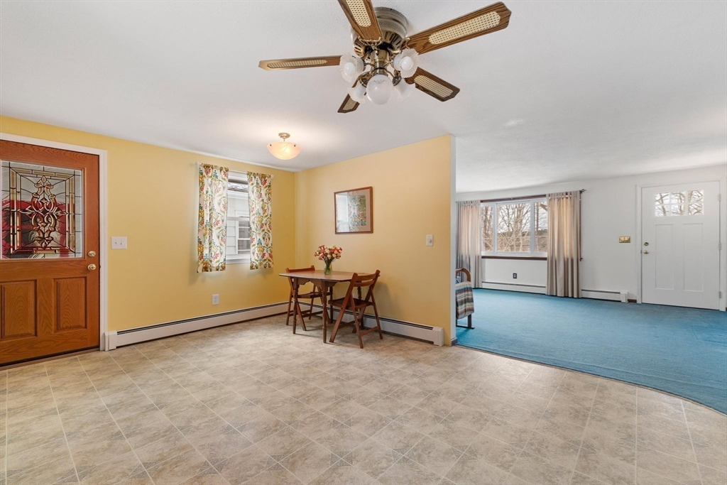 8 Cider Mill Road North Brookfield, MA 01535 - Photo 7 of 30 an empty room with windows and ceiling fan