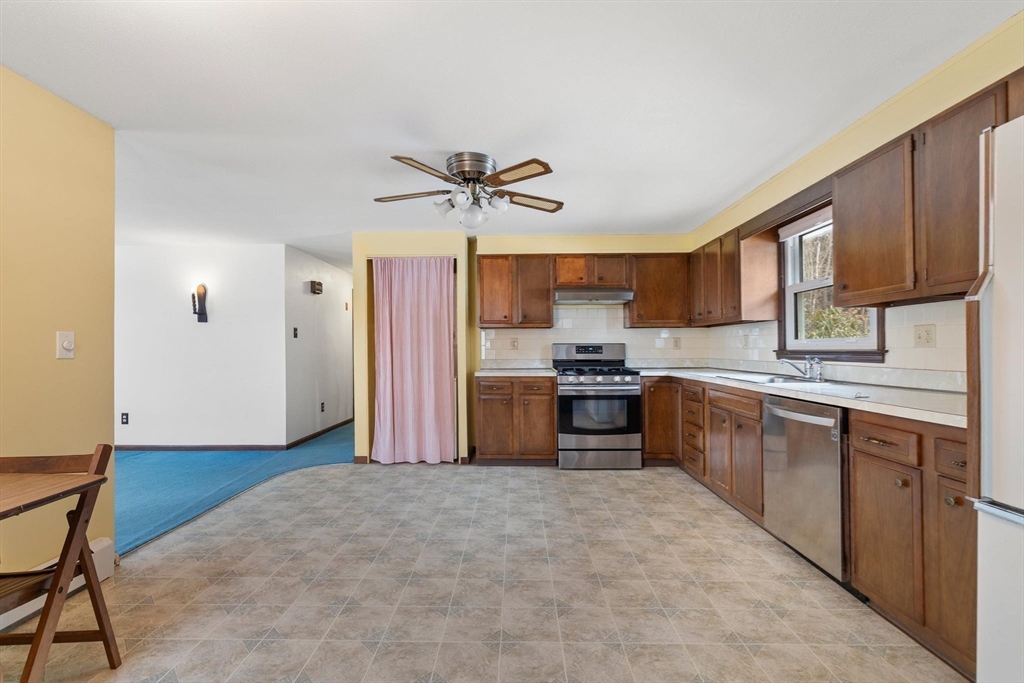 8 Cider Mill Road North Brookfield, MA 01535 - Photo 8 of 30 a kitchen with stainless steel appliances granite countertop a refrigerator and a sink