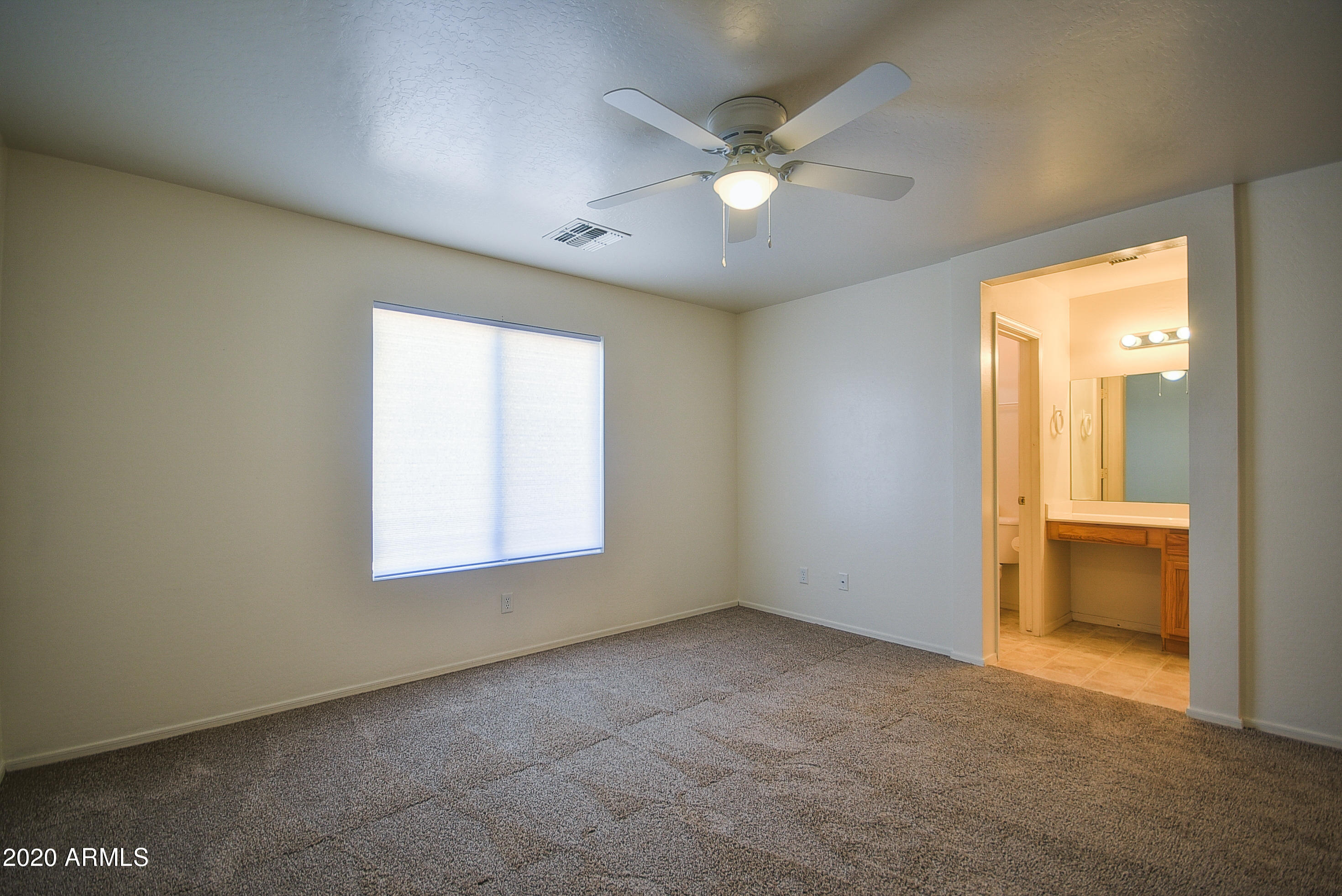 12442 West Hearn Road El Mirage, AZ 85335 - Photo 15 of 22 MASTER BEDROOM VIEW 01