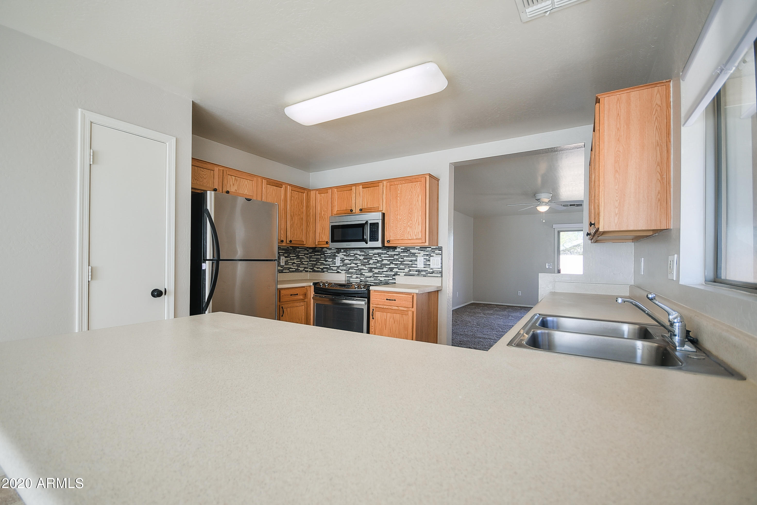 12442 West Hearn Road El Mirage, AZ 85335 - Photo 8 of 22 KITCHEN VIEW 03
