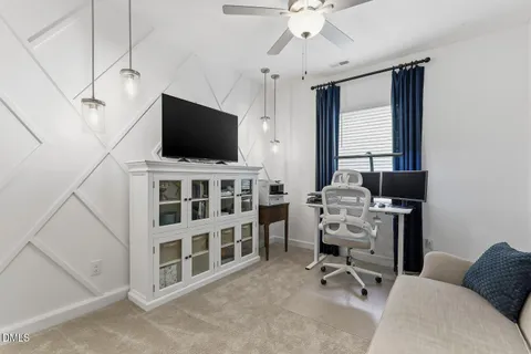 a view of chair and table in a room