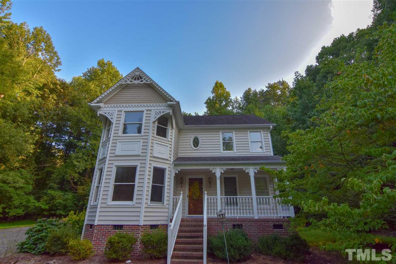 540 North Ridge Circle Roxboro, NC 27574 - Photo 1 of 21 a front view of a house with a garden