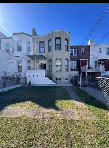 a large pool with outdoor seating