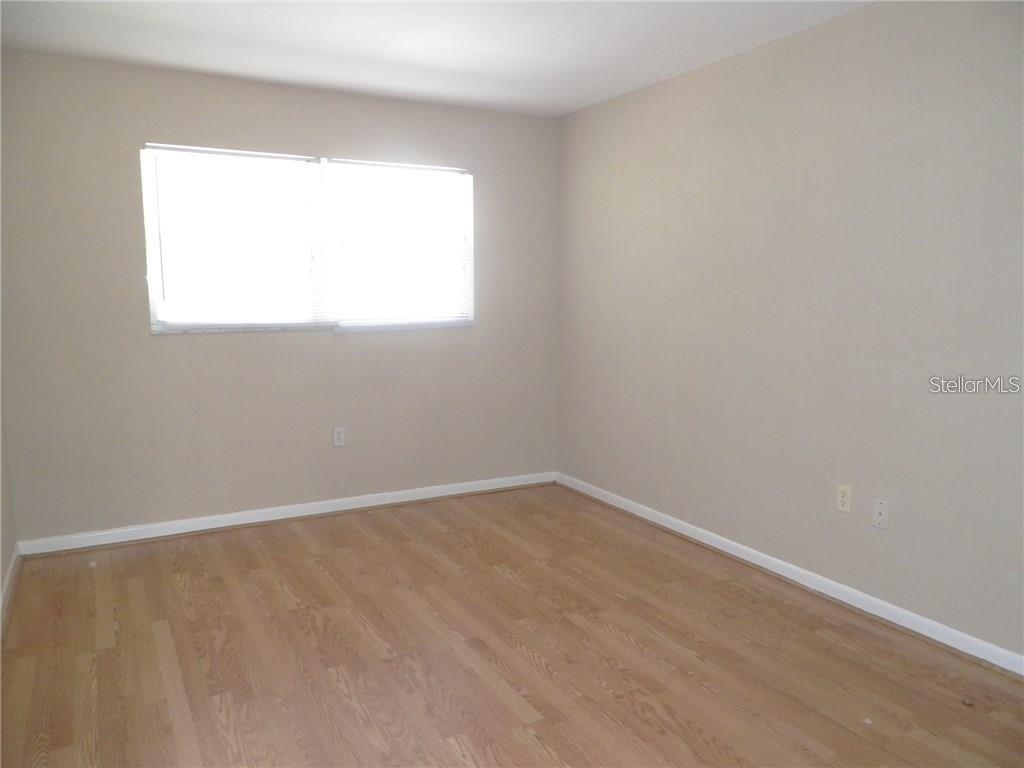 911 Washington Avenue Southwest, Unit 304 Largo, FL 33770 - Photo 16 of 26 an empty room with a window