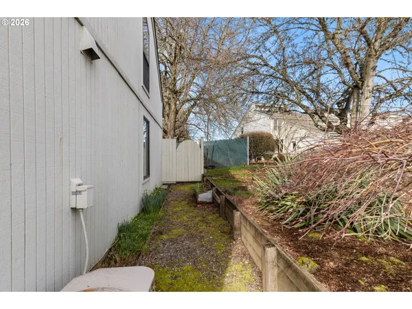 a backyard of a house with lots of green space