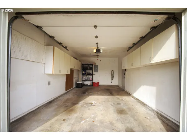 a view of a kitchen with a sink and dishwasher