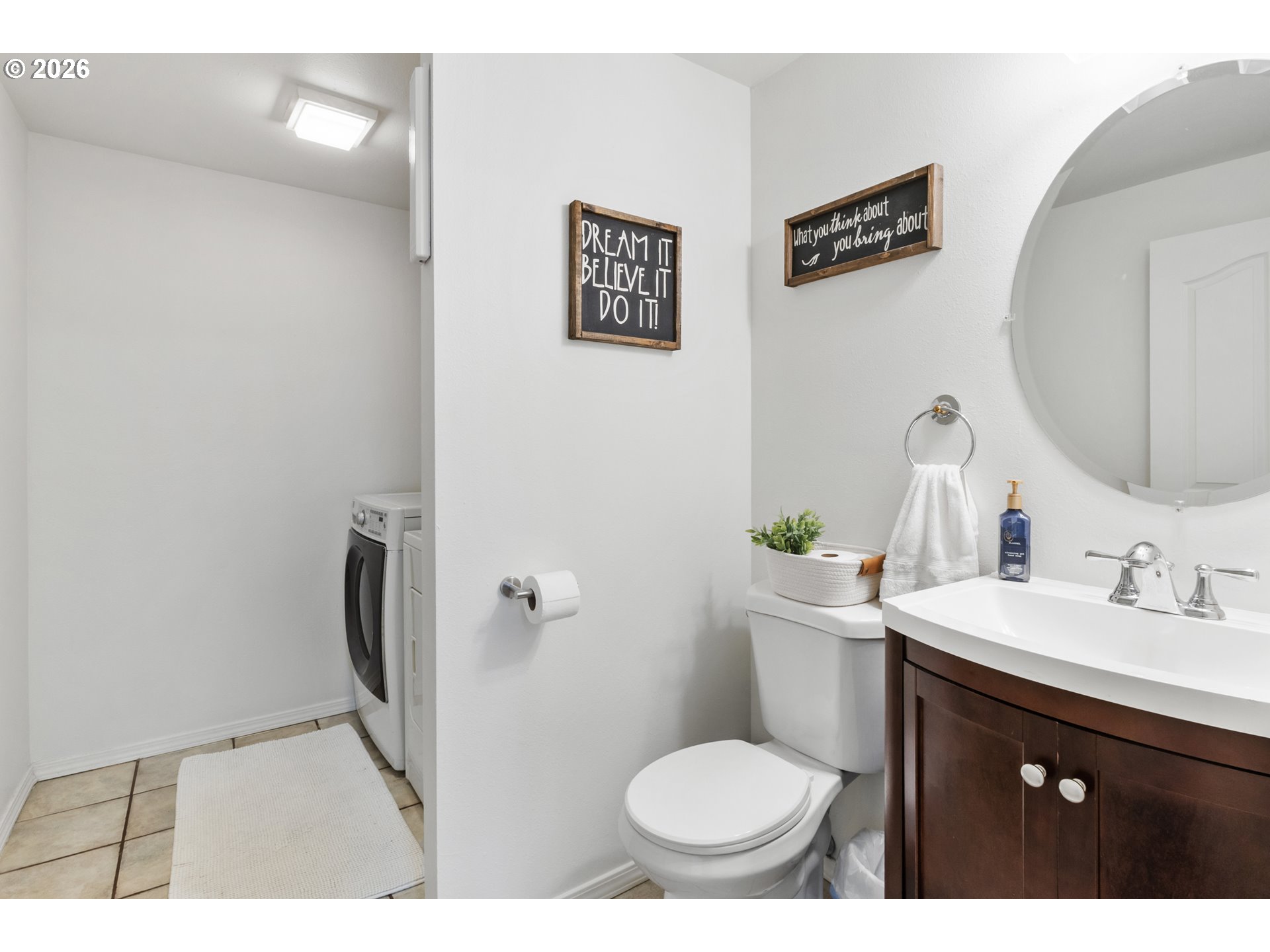 3828 Auburn Road Northeast Salem, OR 97301 - Photo 8 of 34 a bathroom with a toilet sink and mirror