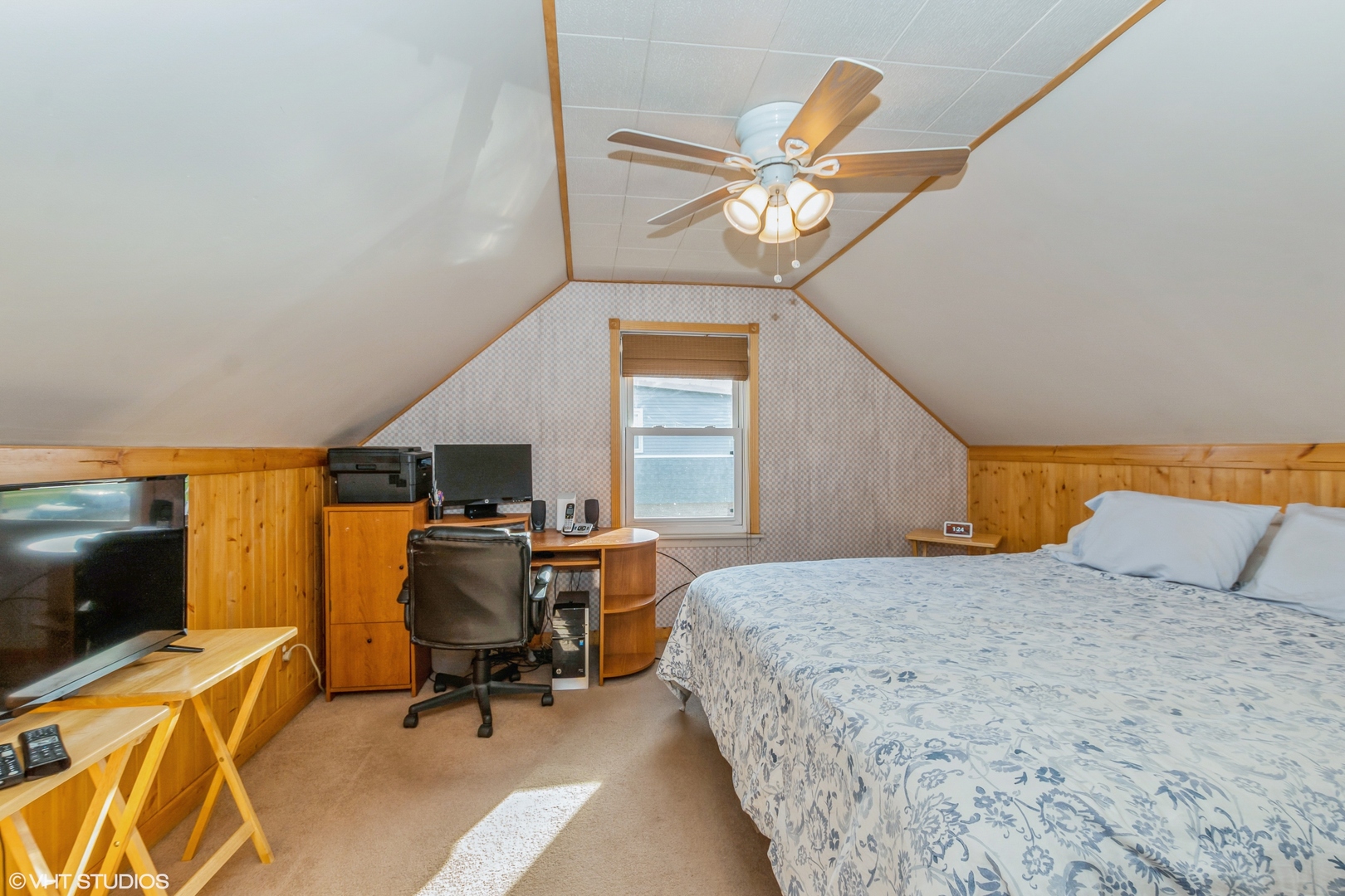 10749 Monitor Avenue Chicago Ridge, IL 60415 - Photo 10 of 11 a bedroom with a bed and a flat screen tv