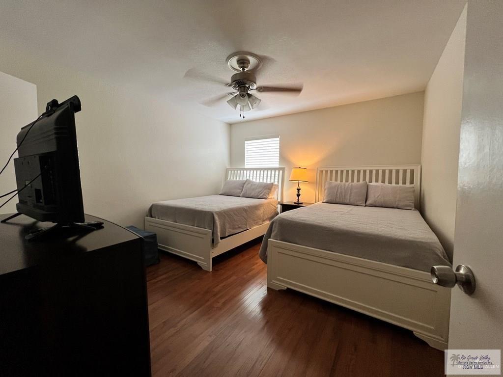4601 Carmen Avenue Olmito, TX 78575 - Photo 16 of 45 a bedroom with a bed and a flat screen tv