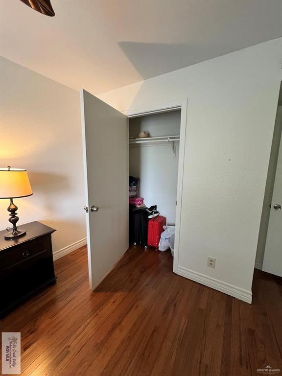 4601 Carmen Avenue Olmito, TX 78575 - Photo 17 of 45 a view of a room with wooden floor and closet