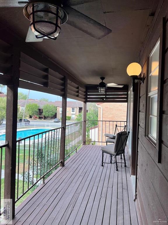 4601 Carmen Avenue Olmito, TX 78575 - Photo 21 of 45 a view of a balcony with furniture and wooden floor