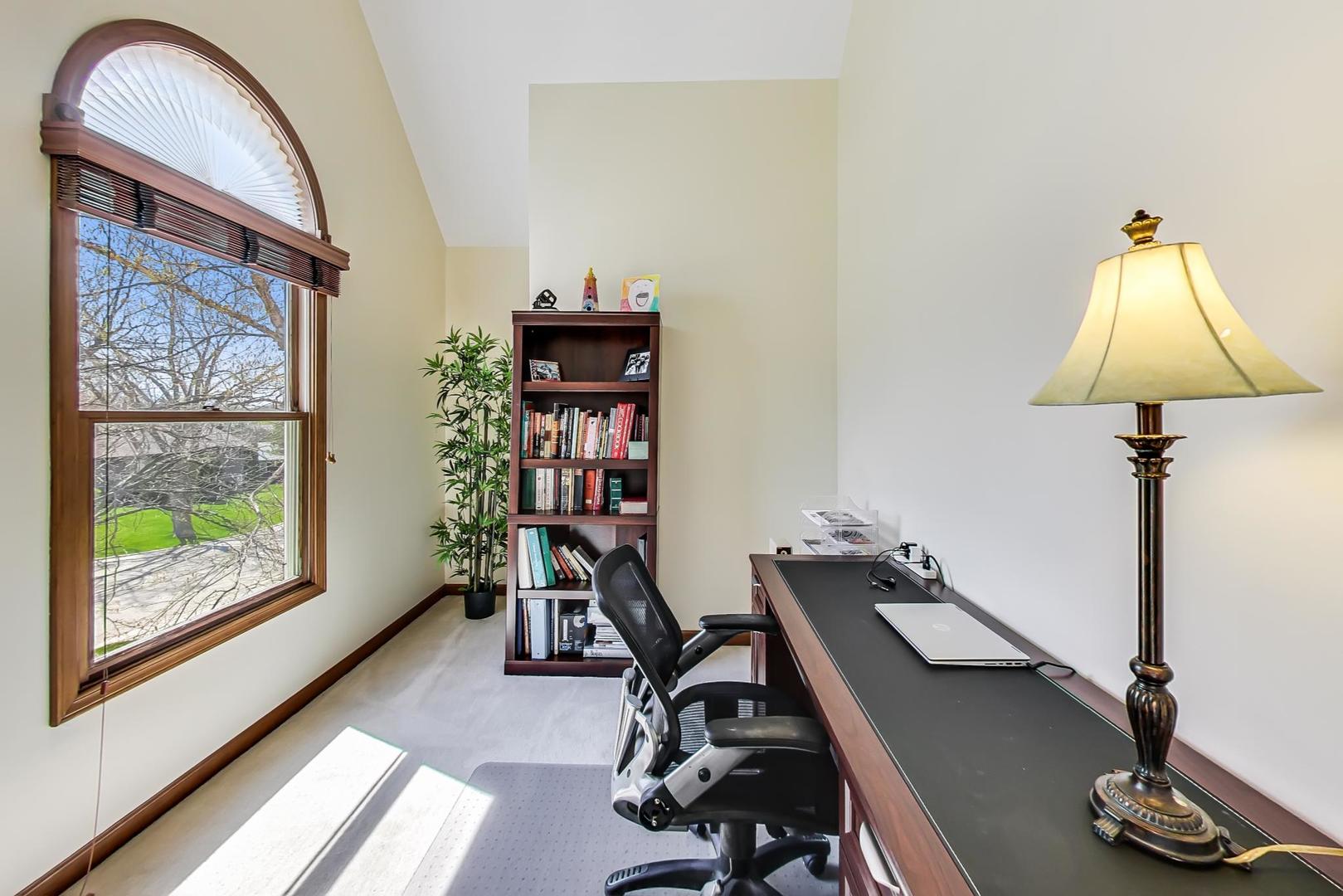 39898 North Harbor Ridge Drive Antioch, IL 60002 - Photo 12 of 27 a view of a workspace with furniture and a window