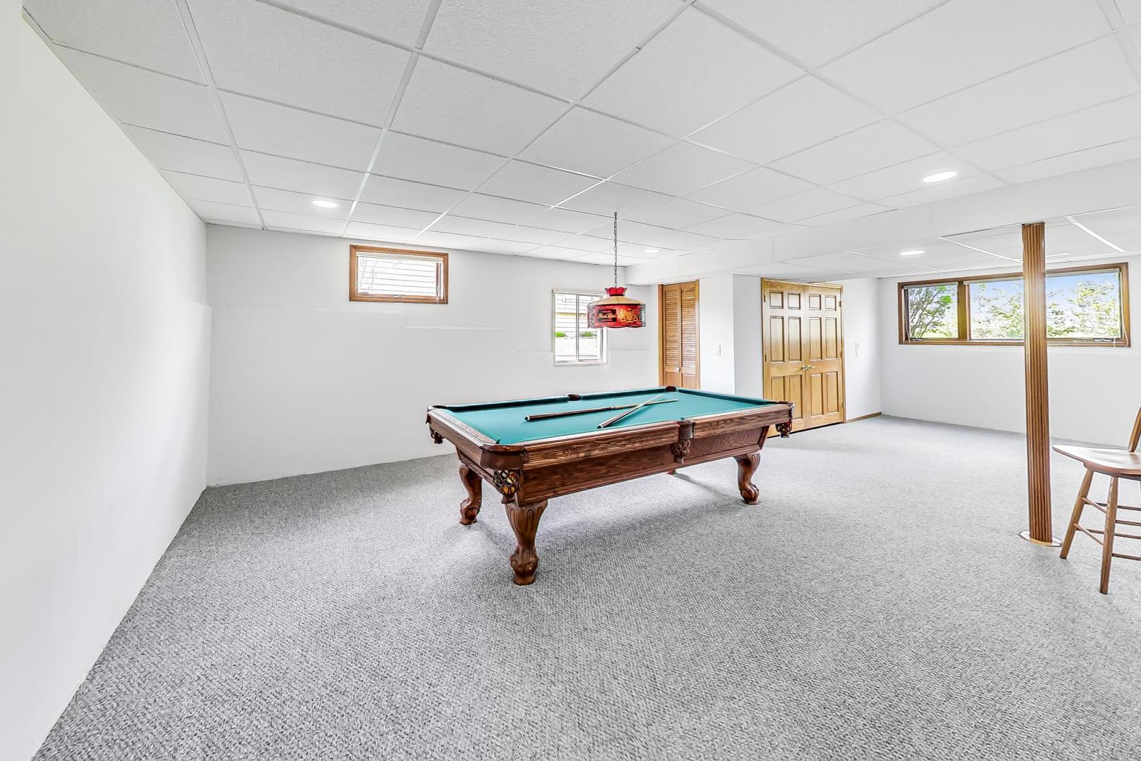 39898 North Harbor Ridge Drive Antioch, IL 60002 - Photo 19 of 27 a room with pool table and windows