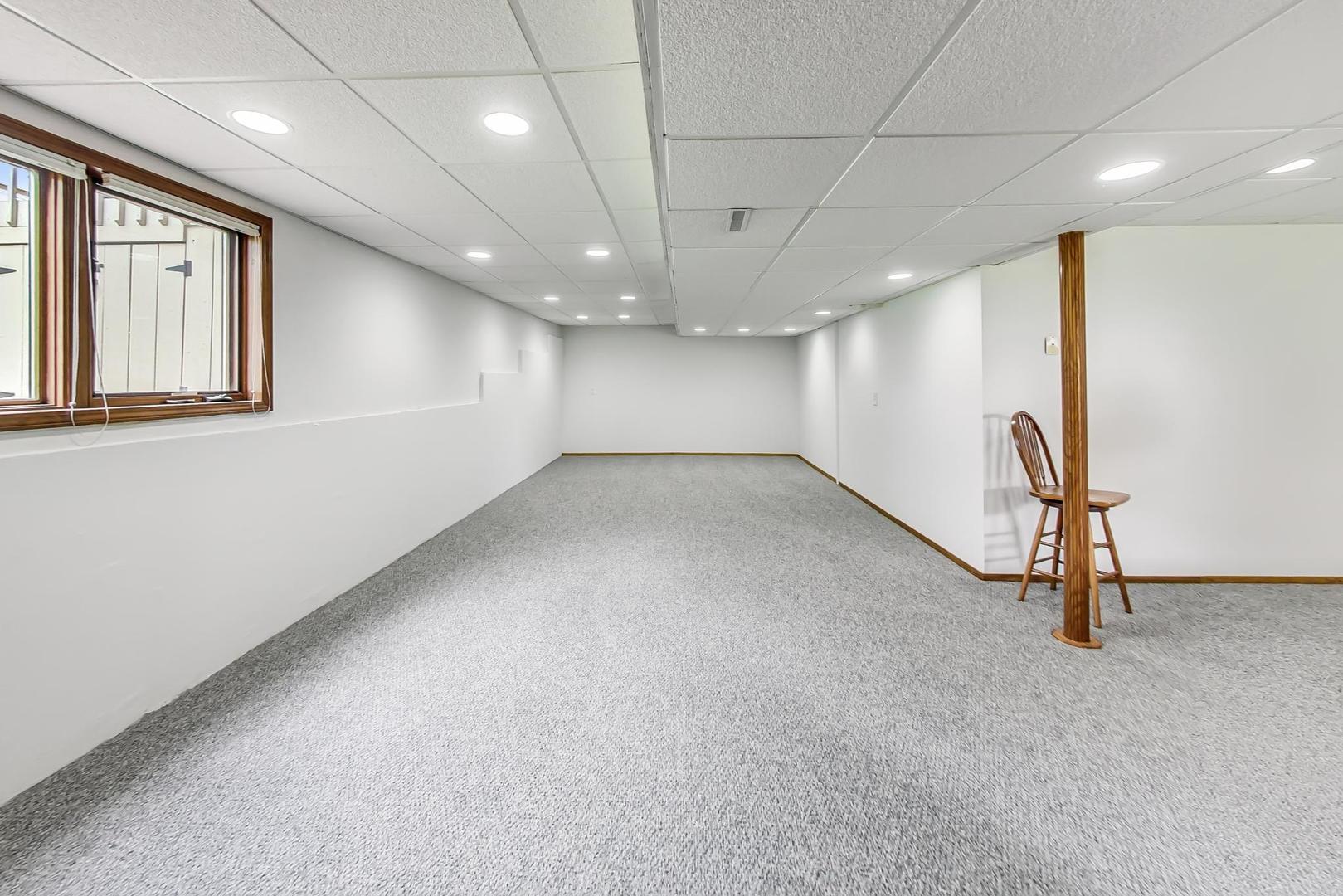 39898 North Harbor Ridge Drive Antioch, IL 60002 - Photo 20 of 27 an empty room with windows