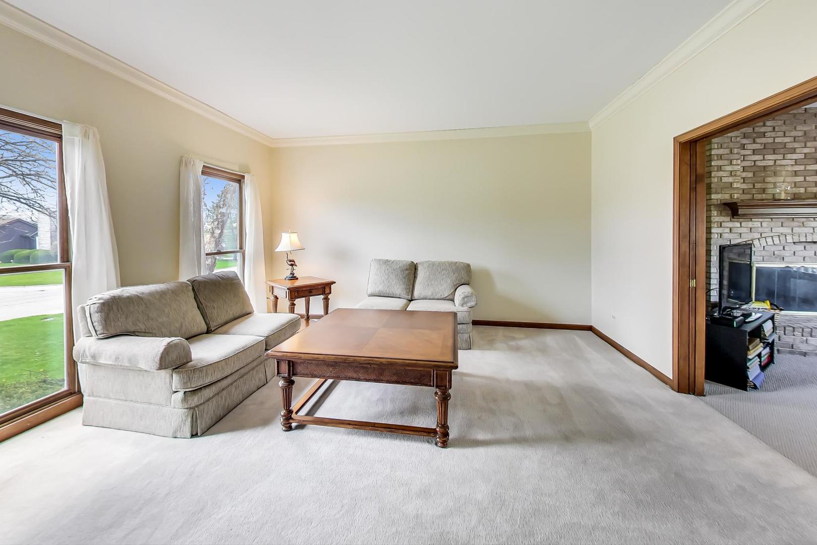 39898 North Harbor Ridge Drive Antioch, IL 60002 - Photo 4 of 27 a living room with furniture and a window