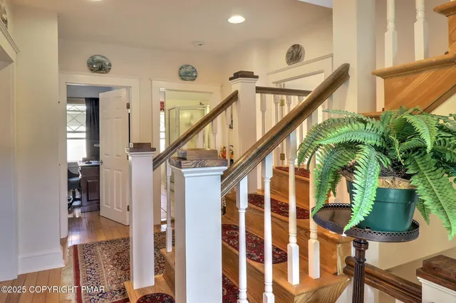 a bed room with a bed and a television