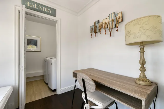 a view of a chairs and table in a patio