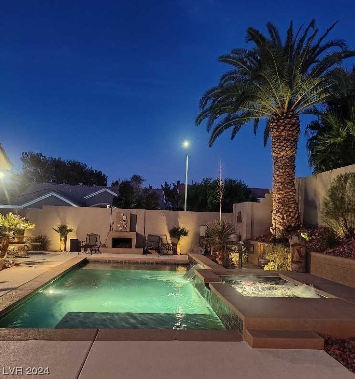 2045 Foxfire Court Henderson, NV 89012 - Photo 47 of 52 Pool with wood fireplace