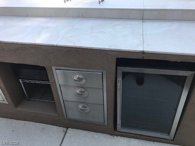 2045 Foxfire Court Henderson, NV 89012 - Photo 52 of 52 Built in Bar with refrigerator-Drawers-Surround so