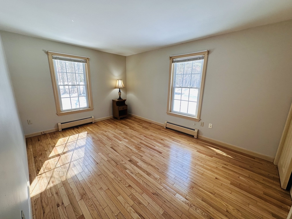 15 South Plain Road Sunderland, MA 01375 - Photo 13 of 31 a view of empty room with wooden floor and fan
