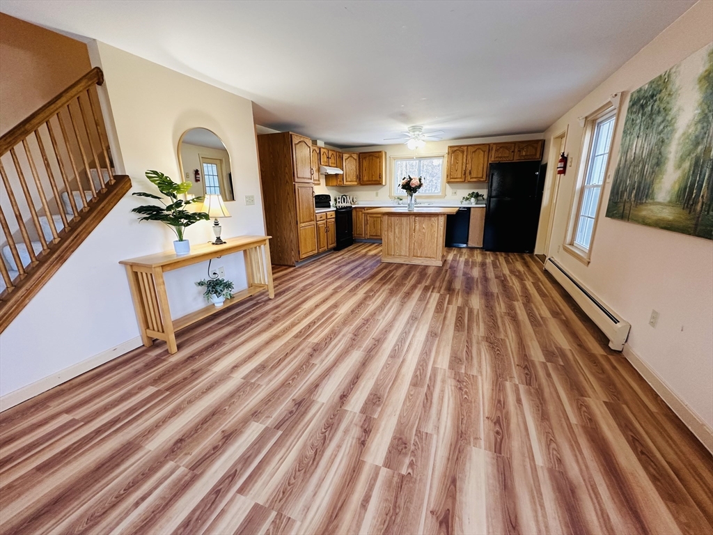 15 South Plain Road Sunderland, MA 01375 - Photo 9 of 31 a living room with furniture and a wooden floor