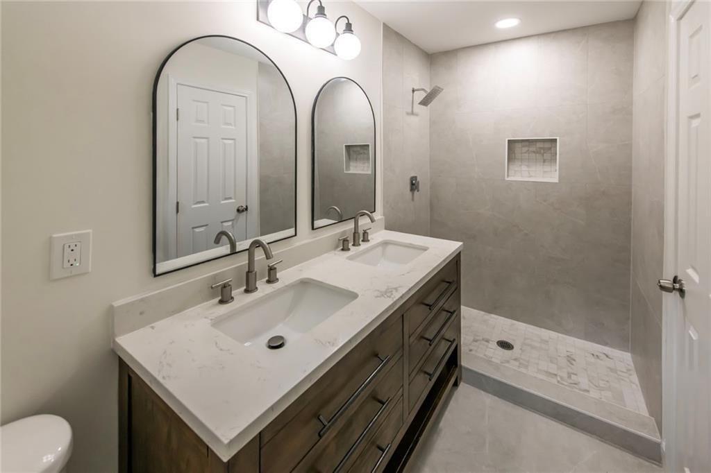 3819 Mason Creek Road Winston, GA 30187 - Photo 20 of 54 a bathroom with a sink and a mirror