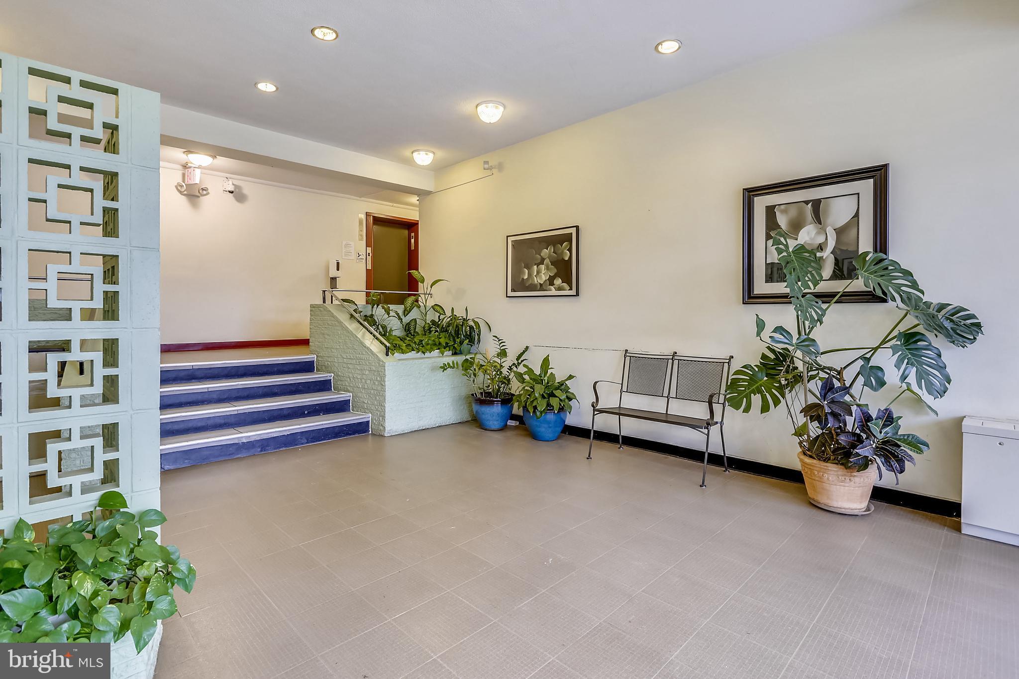 614 Sligo Avenue, Unit 207 Silver Spring, MD 20910 - Photo 2 of 32 Welcoming Lobby Leading to the Elevator