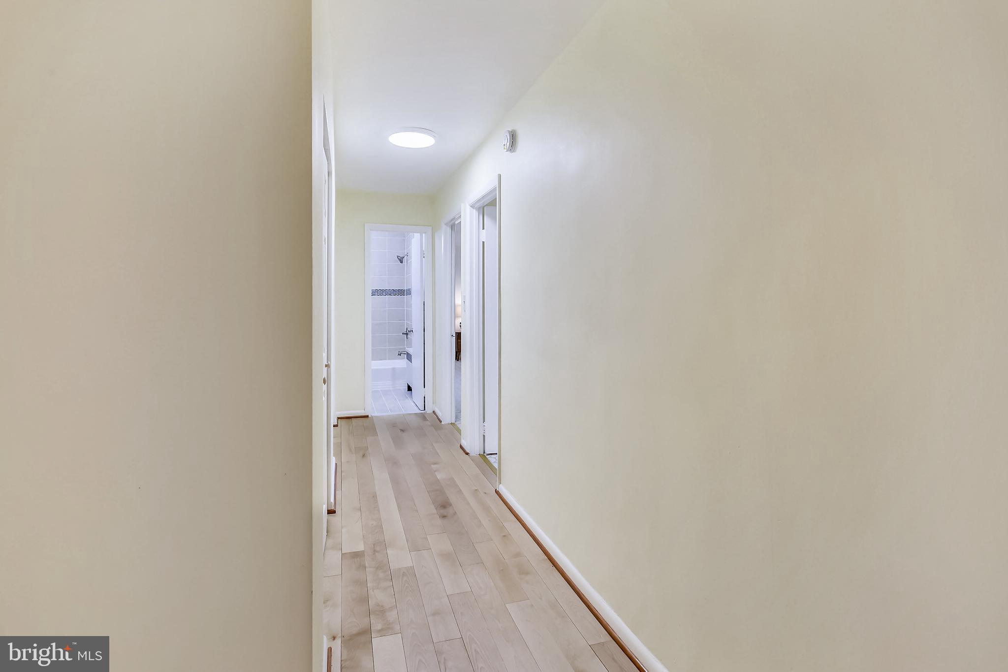 614 Sligo Avenue, Unit 207 Silver Spring, MD 20910 - Photo 15 of 32 Hall with 2 Large Closets leading to BRs & Bath