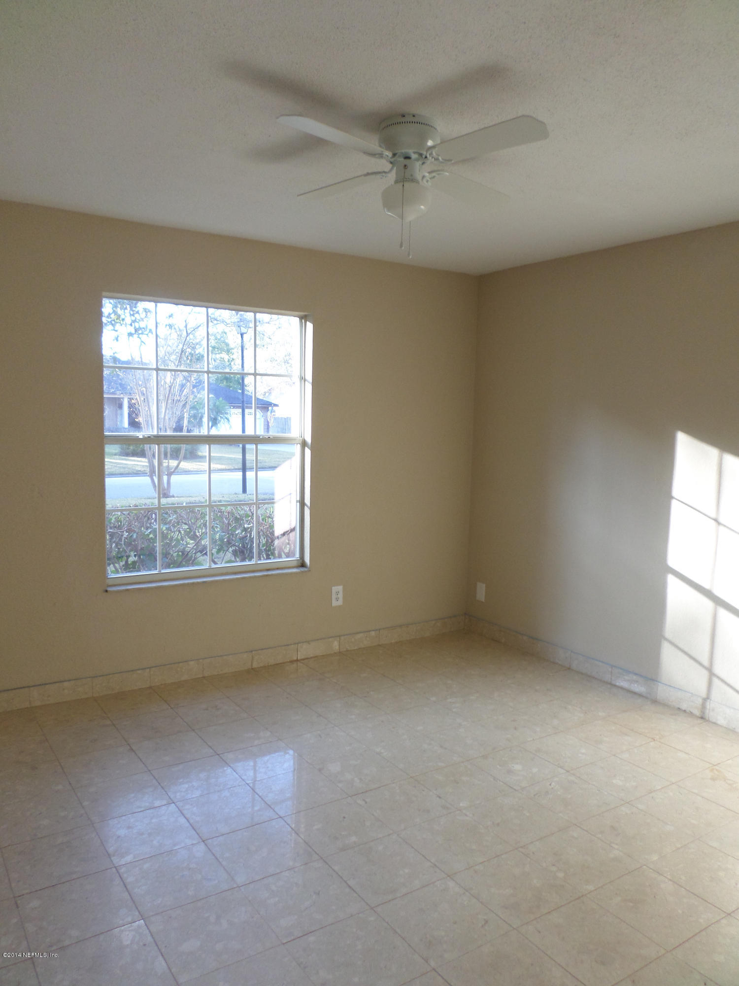 11063 Reading Road Jacksonville, FL 32257 - Photo 15 of 23 an empty room with a empty space and windows