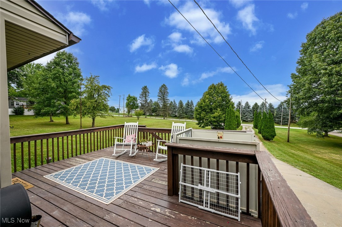2150 Wise Road Green, OH 44720 - Photo 35 of 50 Wooden deck featuring a yard