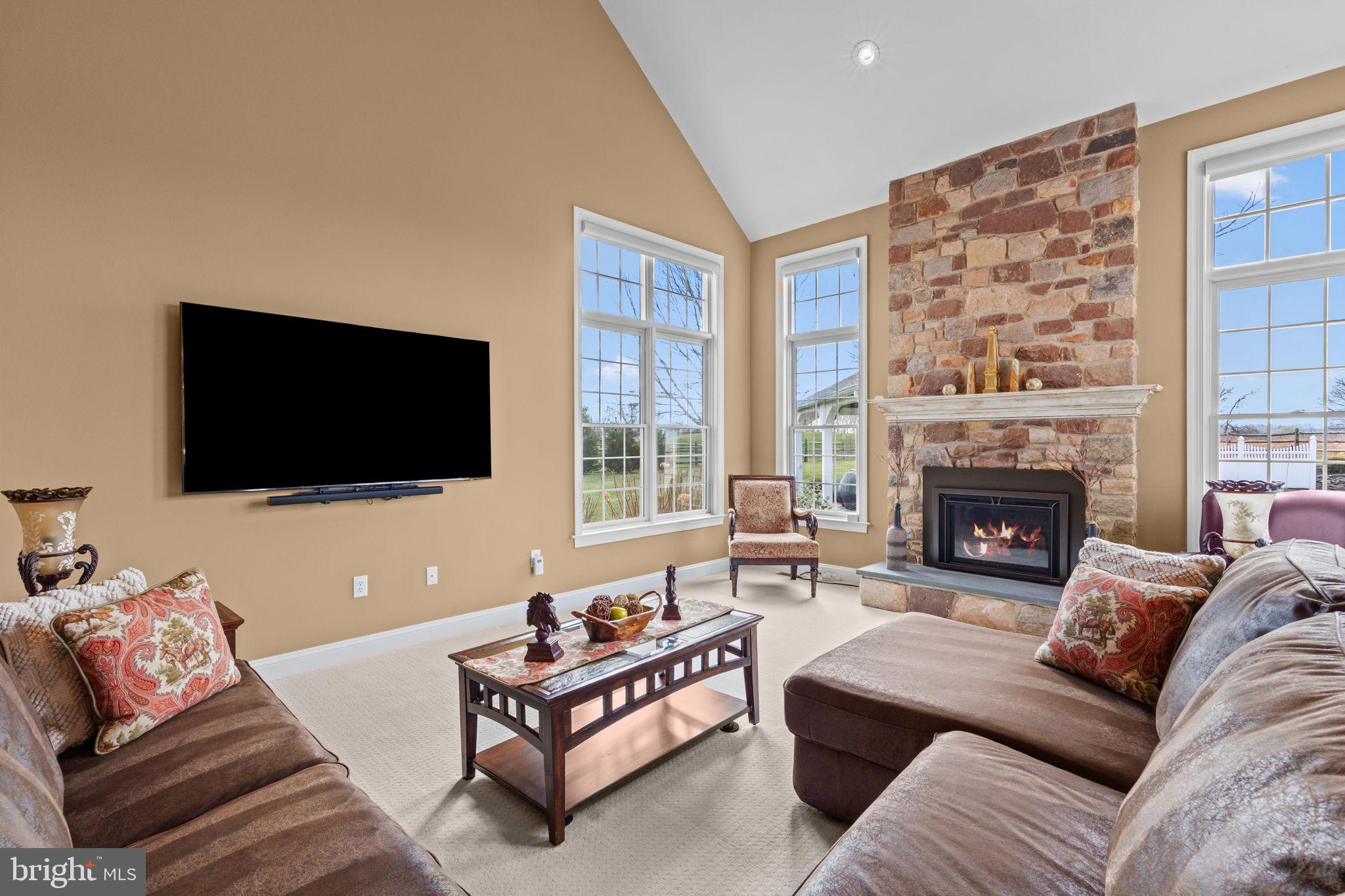 1100 Pineville Road New Hope, PA 18938 - Photo 15 of 97 a living room with furniture and a flat screen tv