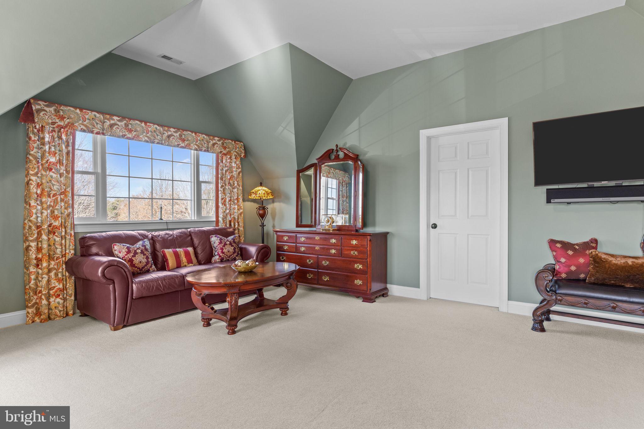 1100 Pineville Road New Hope, PA 18938 - Photo 31 of 97 a living room with furniture and a flat screen tv