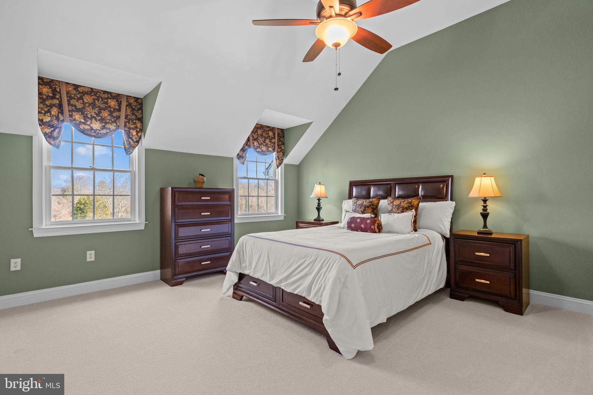 1100 Pineville Road New Hope, PA 18938 - Photo 44 of 97 a bedroom with a bed and a chandelier