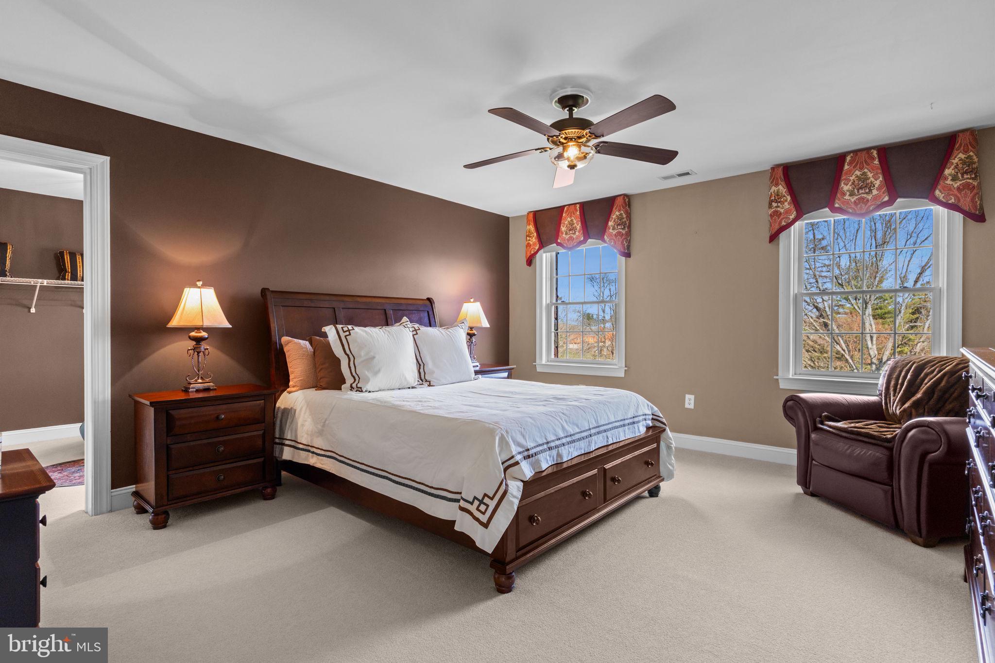 1100 Pineville Road New Hope, PA 18938 - Photo 47 of 97 a spacious bedroom with a bed and ceiling fan