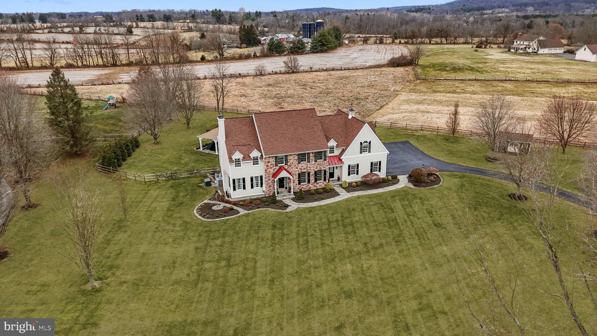 1100 Pineville Road New Hope, PA 18938 - Photo 89 of 97 an aerial view of a house with a lake view