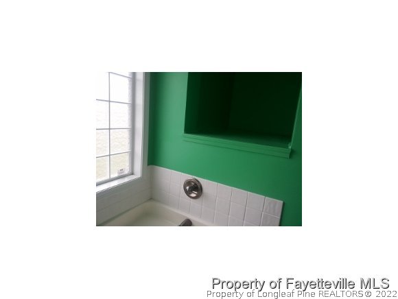 3224 Rozier Siding Road St. Pauls, NC 28384 - Photo 13 of 19 a bathroom with a sink and mirror