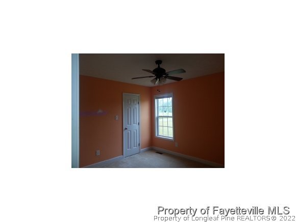 3224 Rozier Siding Road St. Pauls, NC 28384 - Photo 14 of 19 a upper view of a living room with a black white checkered floor