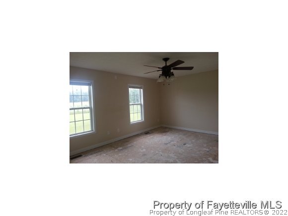 3224 Rozier Siding Road St. Pauls, NC 28384 - Photo 9 of 19 a living room with a couch