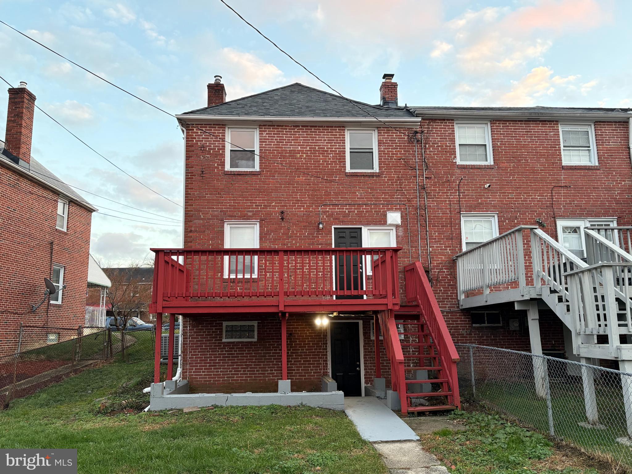 1324 Winston Avenue Baltimore, MD 21239 - Photo 33 of 33 a view of front of a house with a yard