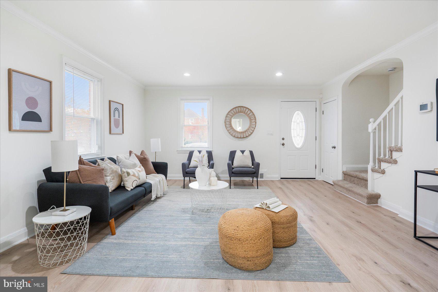 1324 Winston Avenue Baltimore, MD 21239 - Photo 6 of 33 a living room with furniture and wooden floor