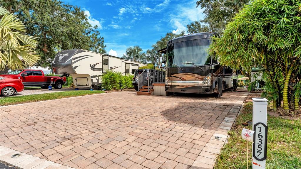 16357 Cherry Tree Court Clermont, FL 34714 - Photo 5 of 27 a car parked on the side of a street