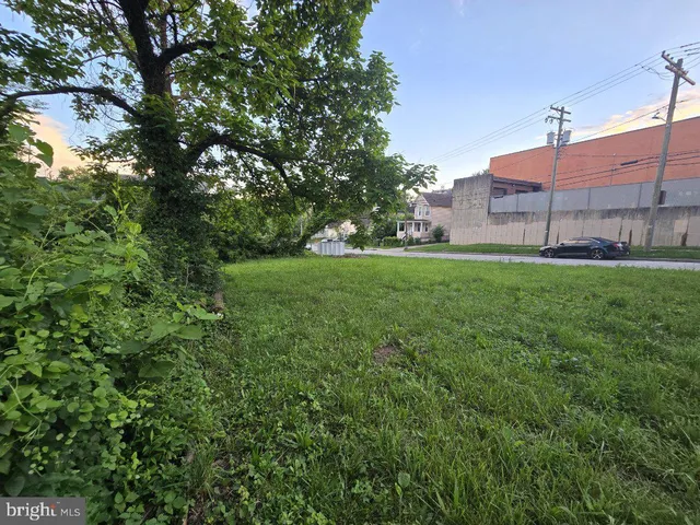 a view of a city with a building in the background