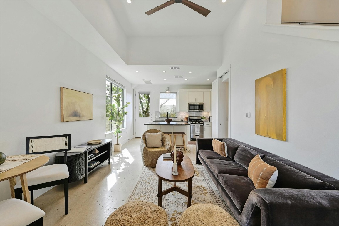 2414 East 8th Street, Unit 2 Austin, TX 78702 - Photo 1 of 1 a living room with furniture and a piano
