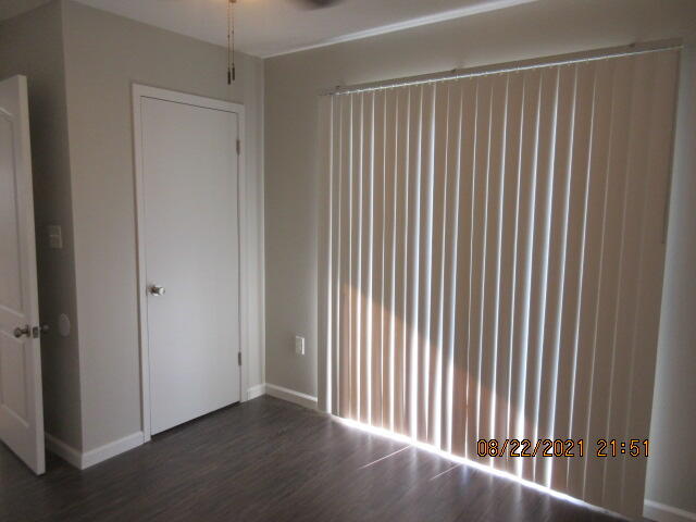404 Adam Street Northwest Fort Walton Beach, FL 32548 - Photo 12 of 25 an empty room with wooden floor and windows