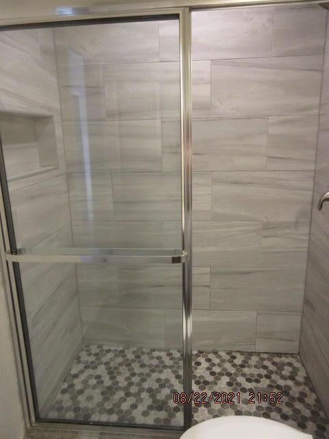 404 Adam Street Northwest Fort Walton Beach, FL 32548 - Photo 13 of 25 a bathroom with a shower