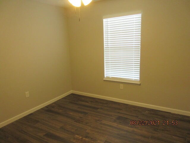 404 Adam Street Northwest Fort Walton Beach, FL 32548 - Photo 15 of 25 a view of a small space with wooden floor and a window